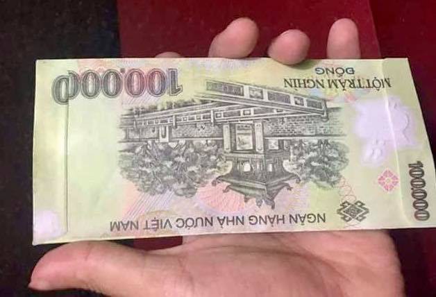 Bao lì xì bằng tiền 500 ngàn đồng gây sốt thị trường Tết - Ảnh 4.